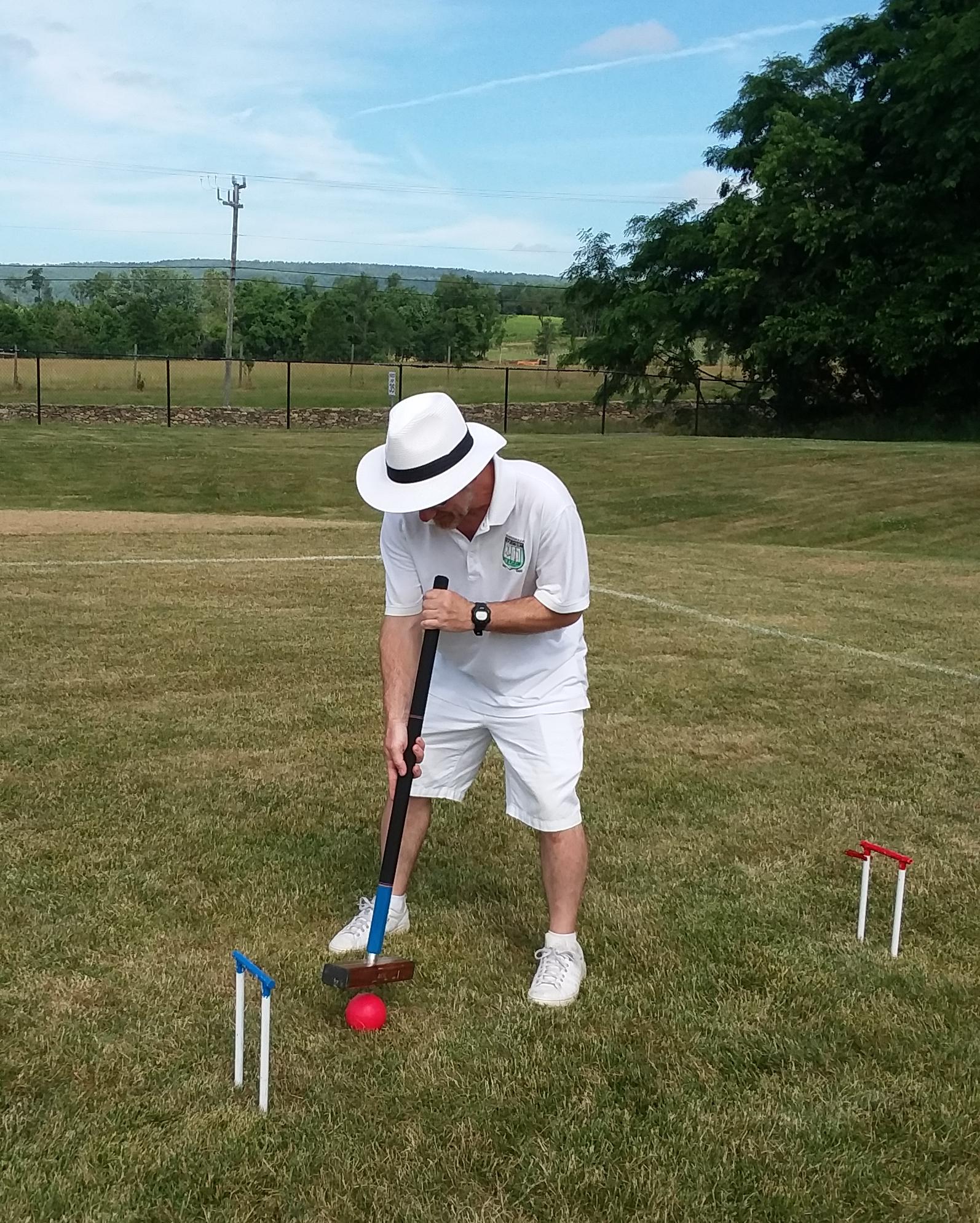Bryan Christian playing 9-wicket croquet in Round Hill, VA
Thanks to Gail Rubin for the photo. | Photo by Macey White Bryan Christian