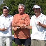 Tournament Director Matt Griffith presents first-place trophies to Doubles winners Nick Zink (l) and Matt Smith (r), 2009 USCA Nine-Wicket National Championships | Photo by Dylan Goodwin